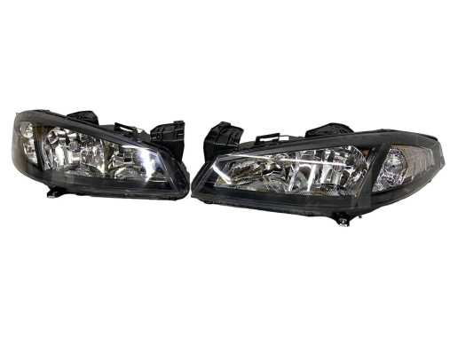 Tyc Фари передні комплект Renault Laguna 2 (Рено Лагуна 2) 2005-2007 770106167 7701061669 - Заображення 6
